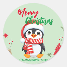 Pegatina Redonda Felices fiestas navideñas en el pingüino de Santa