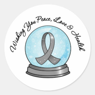 Pegatina Redonda Felices Navidad Snowglobe de la cinta del cáncer