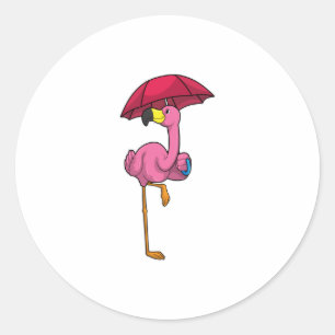 Pegatina Redonda Flamingo en la lluvia con paraguas