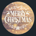 Pegatina Redonda Flauta de nieve Rustic Wood Merry Christmas<br><div class="desc">Con nieve cayendo sobre un elegante diseño navideño en un rústico fondo de paneles de madera. Diseñado por Thisisnotme©</div>
