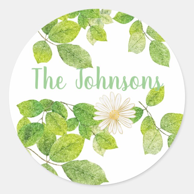 Pegatina Redonda Flor blanca y jardín de hojas verdes (Anverso)