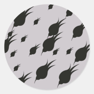 Pegatina Redonda flor negra en copos de nieve