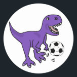 Pegatina Redonda Funny jugador de dinosaurio morado T-rex<br><div class="desc">El divertido y humorístico dinosaurio T-rex que juega al fútbol o al diseño original del arte futbolístico es lo mejor para la gente que ama los dinosaurios,  los deportes de fútbol y el fútbol.</div>