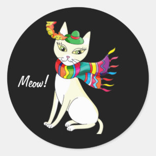 Pegatina Redonda gato decorativo blanco en un gorra y bufanda en ne