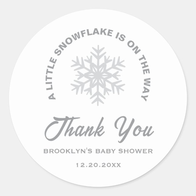 Pegatina Redonda Género neutro en invierno con copo de nieve en Bab (Anverso)