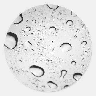 Pegatina Redonda Gotas de lluvia en vidrio