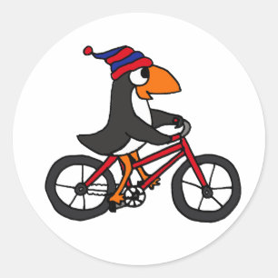 Pegatina Redonda Gracioso pingüino en bicicleta roja