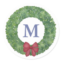 Guirnalda festiva de monograma con reverencia roja