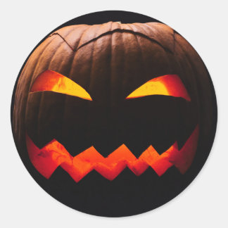 Pegatina Redonda Halloween de la cara de calabaza