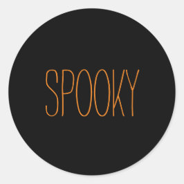 Pegatina Redonda Halloween negro y naranja espeluznante escrito a m