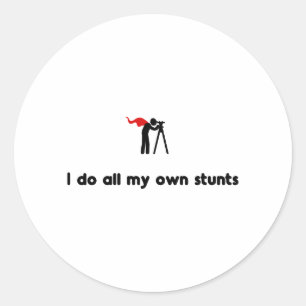 Pegatina Redonda Héroe que examina de la tierra