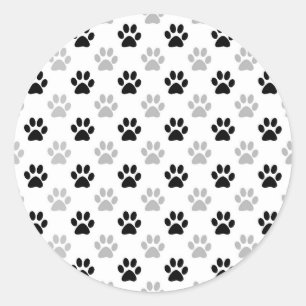 Pegatina Redonda Huellas de cachorro en blanco y negro