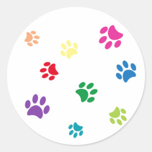 Pegatina Redonda Huellas de patas pintadas con colores de arcoíris