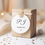 Pegatina Redonda Iniciales simples de monograma gracias boda<br><div class="desc">Blanco y negro simple mínimo clásico caligrafía romántica clásica estilo tradicional estilo monograma iniciales boda gracias plantilla pegatina con dos corazoncitos pequeños.            Fácil de personalizar con el monograma de pareja de novios y novios.</div>