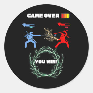 Pegatina Redonda Juego sobre la batalla de los videojuegos