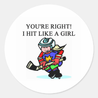 Pegatina Redonda jugador de hockey chica