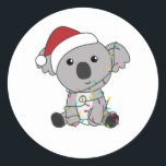 Pegatina Redonda Koala Christmas Snow Winter Animals Koalas<br><div class="desc">The Koala for Christmas with fairy lights. Funny animals with gifts and snow to the holidays. Also funny for Christmas in July. Koalas are sweet animals and perfect for Christmas.</div>
