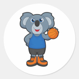 Pegatina Redonda Koala como jugador de baloncesto con baloncesto