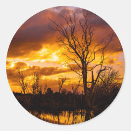 Pegatina Redonda La puesta de sol a orillas del lago es grande
