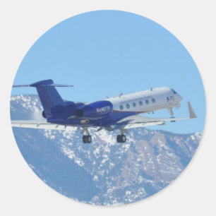 Pegatina Redonda Lanzamiento plano en el aeropuerto