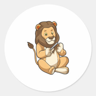 Pegatina Redonda León con flechas en el clavo