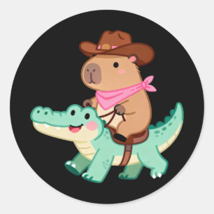 Pegatina Redonda Lindo capybara vaquero con gorra montando un caimá