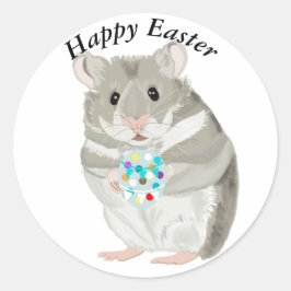 Pegatina Redonda Lindo hámster gris sosteniendo un huevo de Pascua