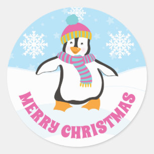 Pegatina Redonda Lindo pingüino de Navidad con sombrero rosa y azul