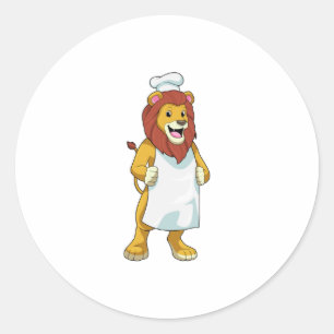 Pegatina Redonda Lion como cocinero con gorra chef y delantal de co
