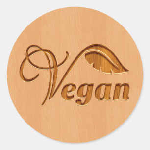 Pegatina Redonda Logotipo del vegano tallado en el efecto de madera