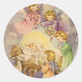 Pegatina Redonda Los ángeles miran al niño Jesús