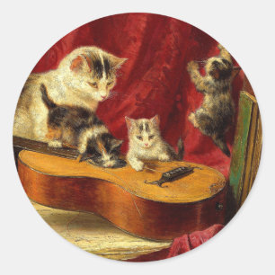 Pegatina Redonda Madre gata y gatitos jugando con guitarra