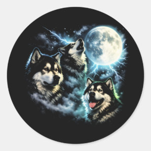Pegatina Redonda Malamute de Alaska aullando a la luna Perro ártico