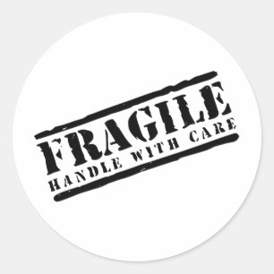 Pegatina Redonda Manejo frágil con diseño de cuidado