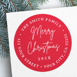Pegatina Redonda Merry Christmas red white script return address<br><div class="desc">Etiquetas de direcciones de retorno de vacaciones de invierno con tu dirección de retorno y el texto "Feliz Navidad" y un año personalizado con un tipo de letra manuscrita. Texto blanco sobre fondo rojo. Todos los colores son personalizable.</div>