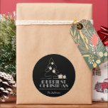 Pegatina Redonda Merry Christmas Tree Black<br><div class="desc">Las palabras Navidades más meritorios con letras antiguas retro, un árbol de sketch blanco con ornamentos falsos de Relieve metalizado de oro y regalos aparecen en estos pegatinas redondos negros personalizados con el nombre de tu familia. Elegante para cualquier ocasión de vacaciones de Navidades o como regalo de la anfitriona....</div>