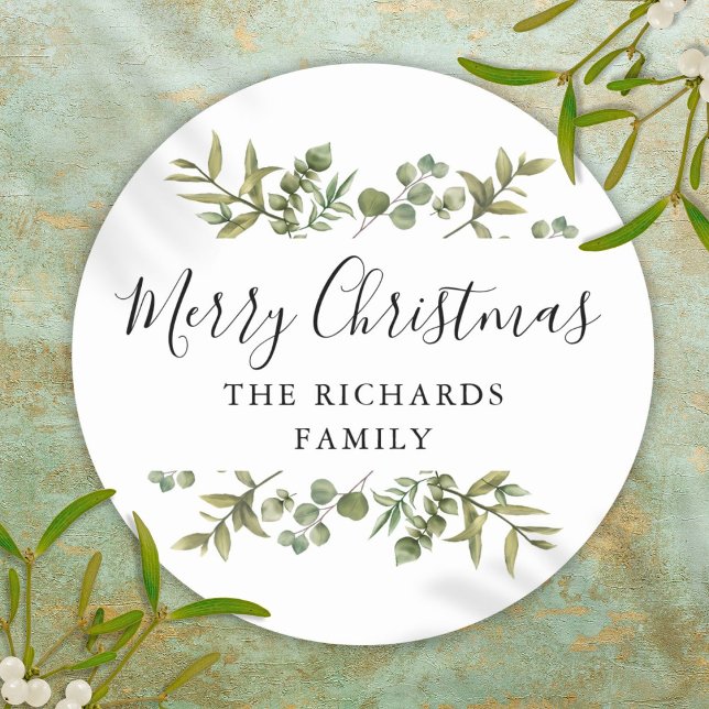 Pegatina Redonda Moderno Greenery Feliz Navidad Nombre de la famili (Modern Greenery Merry Christmas Family Name Classic Round Sticker)