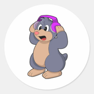 Pegatina Redonda Mole en la música con auriculares