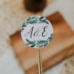Pegatina Redonda Monograma Boda de follaje abundante<br><div class="desc">Elegantes pegatinas botánicos para sus invitaciones de boda o favores presentan sus iniciales en tipografía de escritura caligráfica con letras a mano,  rodeados de frondosos follaje verde acuarela y ramas. Diseñado para coordinar con nuestro boda Abundant Foliage y la colección de invitaciones a eventos.</div>