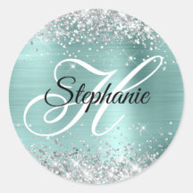 Monograma de Relieve metalizado de color turquesa 