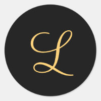 Monograma , L inicial de color dorado sobre negro,