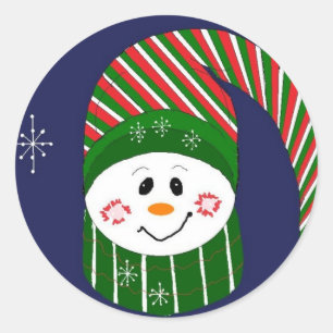 Pegatina Redonda Muñeco de nieve con un sombrero largo a rayas