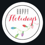 Pegatina Redonda Navidades coloridos iluminan feriado feliz/ blanco<br><div class="desc">Navidades coloridos Diseño de luces con un saludo de vacaciones feliz en blanco. Excelente para envolver regalos,  sellar sobres,  adjuntar etiquetas a un paquete o poner en tus hijos bolsas de almuerzo!!</div>
