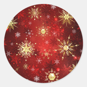 Pegatina Redonda Navidades Copos de nieve dorados con fondo rojo