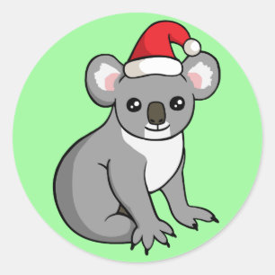 Pegatina Redonda Navidades cortos Koala en Santa Hat dibujando Pega