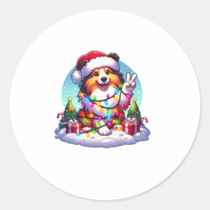 Pegatina Redonda Navidades de Peace Hand Shetland Sheepdog iluminan