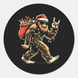 Pegatina Redonda Navidades de Santa Bigfoot iluminan sasquatc graci