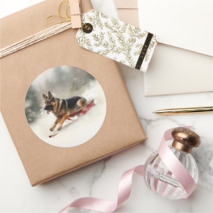 Pegatina Redonda Navidades del Pastor Alemán nevan el invierno