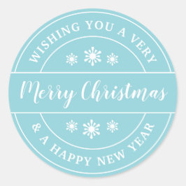 Pegatina Redonda Navidades desean tipografía azul con copos de niev
