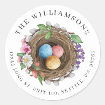 Nido de pájaro floral de primavera y huevos pintad